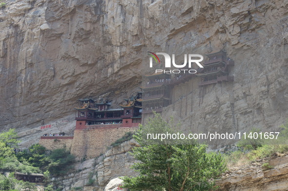 Xuankong Temple is hanging on Hengshan Mountain in Datong City, Shanxi Province, China, on June 23, 2023. 