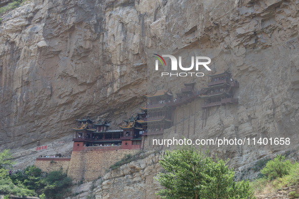 Xuankong Temple is hanging on Hengshan Mountain in Datong City, Shanxi Province, China, on June 23, 2023. 