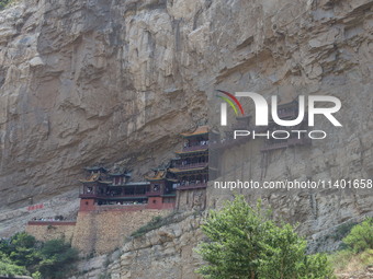 Xuankong Temple is hanging on Hengshan Mountain in Datong City, Shanxi Province, China, on June 23, 2023. (