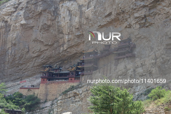 Xuankong Temple is hanging on Hengshan Mountain in Datong City, Shanxi Province, China, on June 23, 2023. 