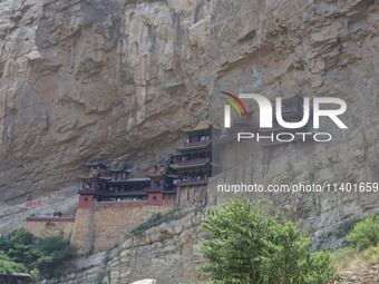 Xuankong Temple is hanging on Hengshan Mountain in Datong City, Shanxi Province, China, on June 23, 2023. (