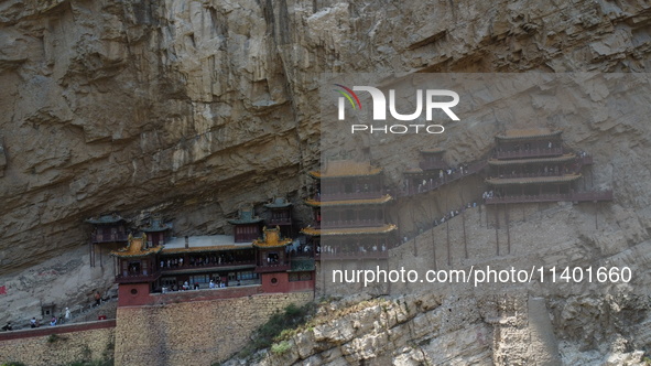 Xuankong Temple is hanging on Hengshan Mountain in Datong City, Shanxi Province, China, on June 23, 2023. 