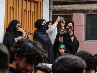 Kashmiri Shiite Muslims are watching a Muharram procession on the fifth day of Ashura, in Srinagar, Jammu and Kashmir, on July 12, 2024. (