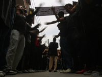 Shiite Muslim mourners are taking part in a Muharram procession on the fifth day of Ashura, in Srinagar, Jammu and Kashmir, on July 12, 2024...