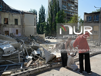 Volunteers are helping clean the premises of the Ohmatdyt National Specialized Children's Hospital destroyed by the Russian missile attack o...