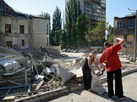 Volunteers are helping clean the premises of the Ohmatdyt National Specialized Children's Hospital destroyed by the Russian missile attack o...