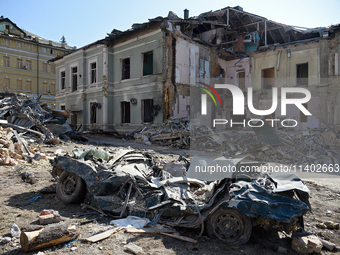 A building destroyed by the Russian missile attack on July 8 is being pictured on the premises of the Ohmatdyt National Specialized Children...