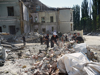 Volunteers are helping clean the premises of the Ohmatdyt National Specialized Children's Hospital destroyed by the Russian missile attack o...