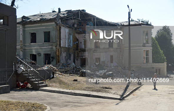 A building destroyed by the Russian missile attack on July 8 is being pictured on the premises of the Ohmatdyt National Specialized Children...