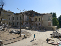 A building destroyed by the Russian missile attack on July 8 is being pictured on the premises of the Ohmatdyt National Specialized Children...