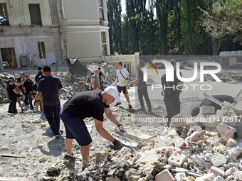 Volunteers are helping clean the premises of the Ohmatdyt National Specialized Children's Hospital destroyed by the Russian missile attack o...