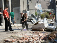 Volunteers are helping clean the premises of the Ohmatdyt National Specialized Children's Hospital destroyed by the Russian missile attack o...