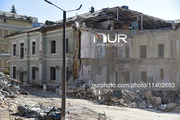 A building destroyed by the Russian missile attack on July 8 is being pictured on the premises of the Ohmatdyt National Specialized Children...