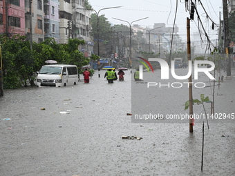 The drum of incessant rainfall woke the people of Dhaka city on Friday as a heavy monsoon shower poured down on the capital.

The rain, wh...