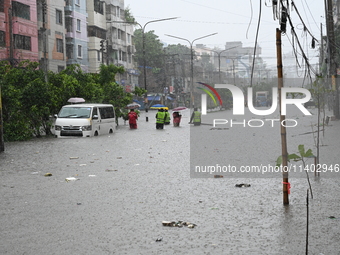 The drum of incessant rainfall woke the people of Dhaka city on Friday as a heavy monsoon shower poured down on the capital.

The rain, wh...