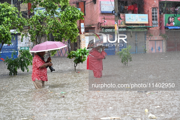 The drum of incessant rainfall woke the people of Dhaka city on Friday as a heavy monsoon shower poured down on the capital.

The rain, wh...