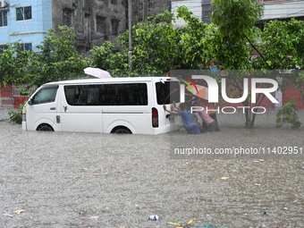 The drum of incessant rainfall woke the people of Dhaka city on Friday as a heavy monsoon shower poured down on the capital.

The rain, wh...