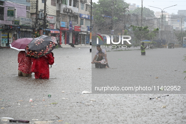 The drum of incessant rainfall woke the people of Dhaka city on Friday as a heavy monsoon shower poured down on the capital.

The rain, wh...