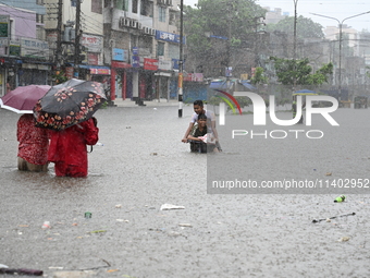 The drum of incessant rainfall woke the people of Dhaka city on Friday as a heavy monsoon shower poured down on the capital.

The rain, wh...