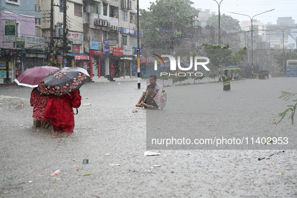 The drum of incessant rainfall woke the people of Dhaka city on Friday as a heavy monsoon shower poured down on the capital.

The rain, wh...