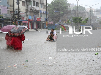 The drum of incessant rainfall woke the people of Dhaka city on Friday as a heavy monsoon shower poured down on the capital.

The rain, wh...