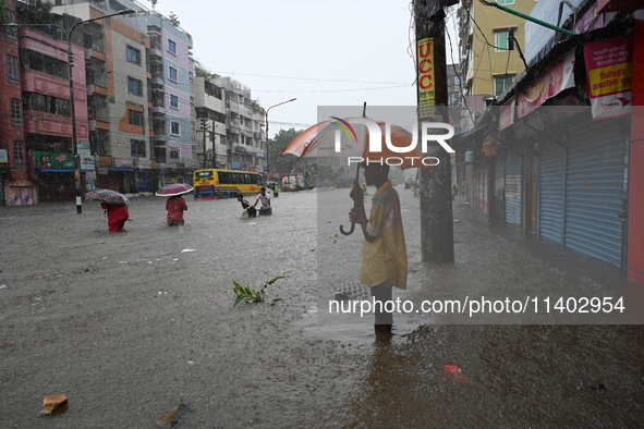 The drum of incessant rainfall woke the people of Dhaka city on Friday as a heavy monsoon shower poured down on the capital.

The rain, wh...