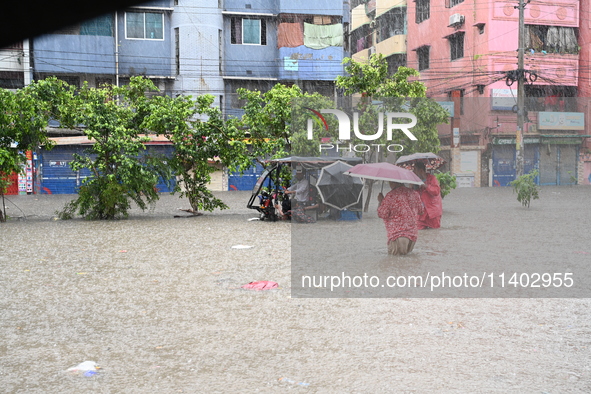 The drum of incessant rainfall woke the people of Dhaka city on Friday as a heavy monsoon shower poured down on the capital.

The rain, wh...