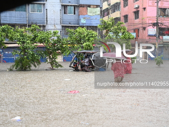 The drum of incessant rainfall woke the people of Dhaka city on Friday as a heavy monsoon shower poured down on the capital.

The rain, wh...