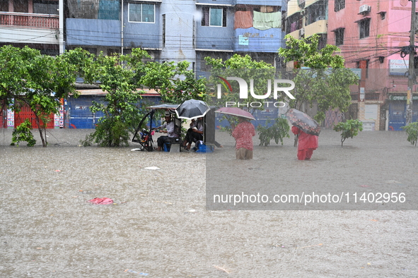 The drum of incessant rainfall woke the people of Dhaka city on Friday as a heavy monsoon shower poured down on the capital.

The rain, wh...