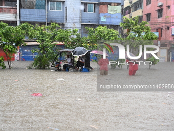 The drum of incessant rainfall woke the people of Dhaka city on Friday as a heavy monsoon shower poured down on the capital.

The rain, wh...