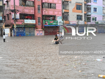 The drum of incessant rainfall woke the people of Dhaka city on Friday as a heavy monsoon shower poured down on the capital.

The rain, wh...