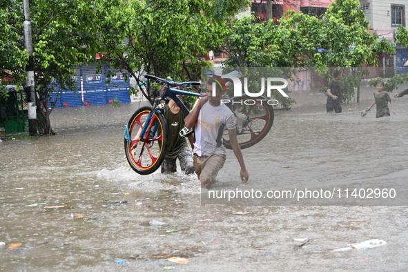 The drum of incessant rainfall woke the people of Dhaka city on Friday as a heavy monsoon shower poured down on the capital.

The rain, wh...