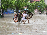 The drum of incessant rainfall woke the people of Dhaka city on Friday as a heavy monsoon shower poured down on the capital.

The rain, wh...