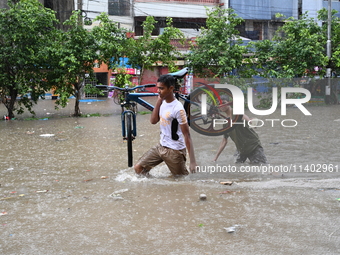 The drum of incessant rainfall woke the people of Dhaka city on Friday as a heavy monsoon shower poured down on the capital.

The rain, wh...