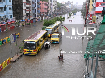 The drum of incessant rainfall woke the people of Dhaka city on Friday as a heavy monsoon shower poured down on the capital.

The rain, wh...