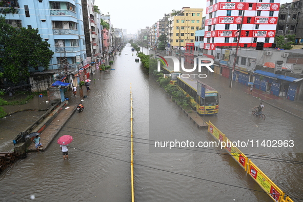 The drum of incessant rainfall woke the people of Dhaka city on Friday as a heavy monsoon shower poured down on the capital.

The rain, wh...