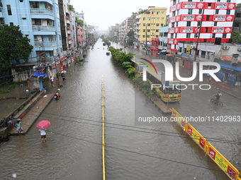 The drum of incessant rainfall woke the people of Dhaka city on Friday as a heavy monsoon shower poured down on the capital.

The rain, wh...