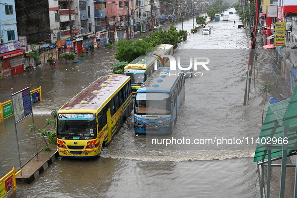 The drum of incessant rainfall woke the people of Dhaka city on Friday as a heavy monsoon shower poured down on the capital.

The rain, wh...