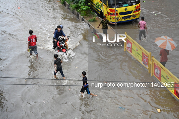 The drum of incessant rainfall woke the people of Dhaka city on Friday as a heavy monsoon shower poured down on the capital.

The rain, wh...