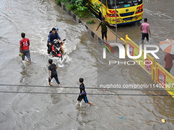 The drum of incessant rainfall woke the people of Dhaka city on Friday as a heavy monsoon shower poured down on the capital.

The rain, wh...