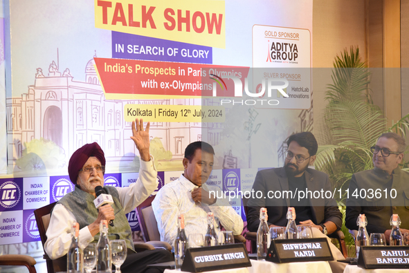 Veteran Olympian Gurbax Singh is speaking during the Indian Chamber of Commerce's talk show on India's prospects in the 2024 Olympics in Kol...