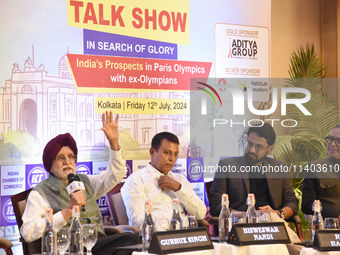 Veteran Olympian Gurbax Singh is speaking during the Indian Chamber of Commerce's talk show on India's prospects in the 2024 Olympics in Kol...