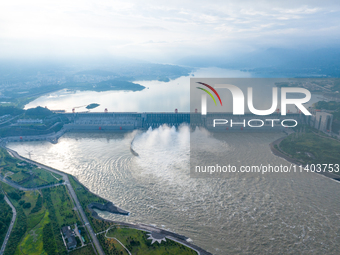 An aerial photo is showing the four holes of the Three Gorges Reservoir discharging flooding water in Yichang, China, on July 12, 2024. (