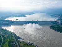 An aerial photo is showing the four holes of the Three Gorges Reservoir discharging flooding water in Yichang, China, on July 12, 2024. (