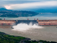 An aerial photo is showing the four holes of the Three Gorges Reservoir discharging flooding water in Yichang, China, on July 12, 2024. (