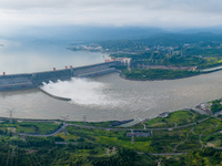 An aerial photo is showing the four holes of the Three Gorges Reservoir discharging flooding water in Yichang, China, on July 12, 2024. (