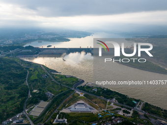 An aerial photo is showing the four holes of the Three Gorges Reservoir discharging flooding water in Yichang, China, on July 12, 2024. (