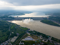 An aerial photo is showing the four holes of the Three Gorges Reservoir discharging flooding water in Yichang, China, on July 12, 2024. (