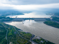 An aerial photo is showing the four holes of the Three Gorges Reservoir discharging flooding water in Yichang, China, on July 12, 2024. (