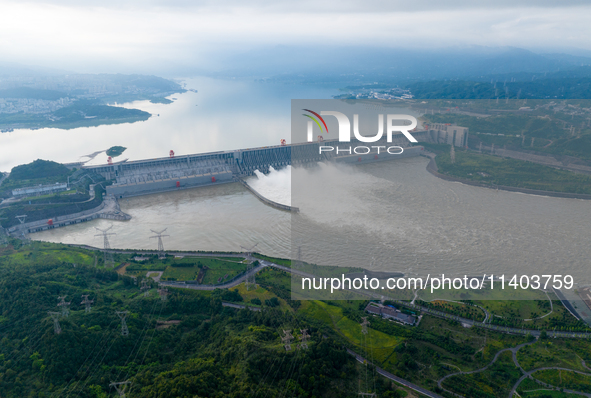 An aerial photo is showing the four holes of the Three Gorges Reservoir discharging flooding water in Yichang, China, on July 12, 2024. 